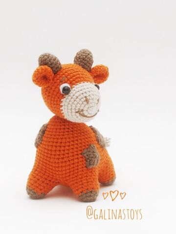 Вязаная игрушка коровка