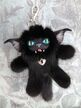 Интерьерная игрушка "Чёрный кот Злючка"