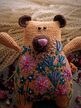 Вязаный мишка с цветочной вышивкой. Ручная работа. В единственном экземпляре.